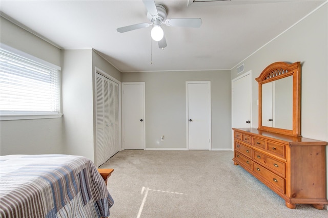 18218 Heritage Ln Unit 8218, Houston, TX 77058 - bedroom featuring light carpet, baseboards, and ceiling fan