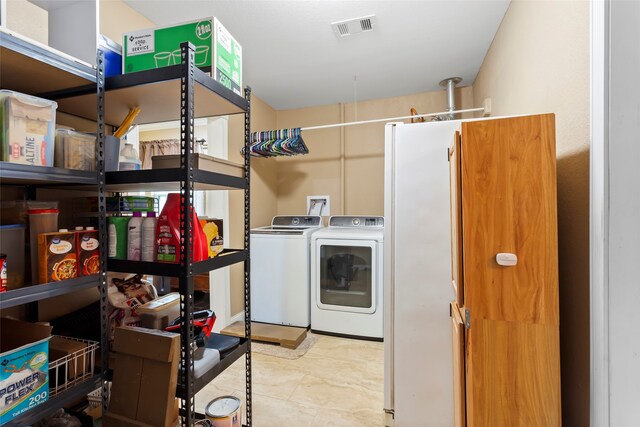 1518 14th Ave N, Texas City, TX 77590 - laundry room featuring separate washer and dryer