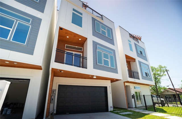 2117 Sauer St, Houston, TX 77004 - view of building exterior with a garage