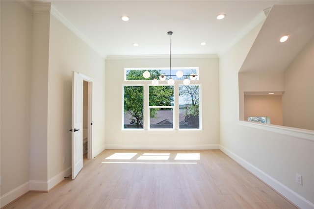 2117 Sauer St, Houston, TX 77004 - unfurnished dining area with crown molding, a chandelier, light wood finished floors, baseboards, and recessed lighting