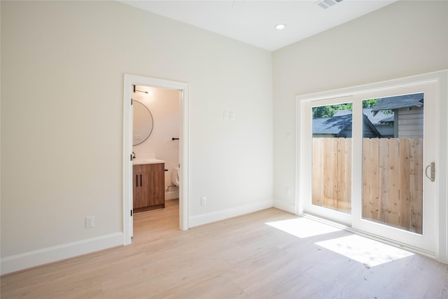2117 Sauer St, Houston, TX 77004 - spare room with light wood-style floors, baseboards, and recessed lighting