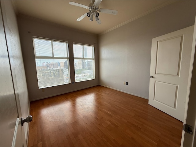 3505 Sage Rd Unit 1807, Houston, TX 77056 - unfurnished room with wood finished floors, crown molding, and ceiling fan