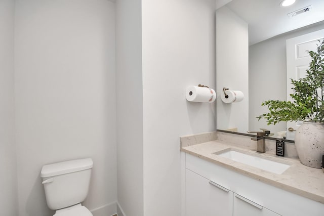 3002B Ventas Dr, Houston, TX 77047 - half bath featuring vanity, toilet, recessed lighting, and baseboards