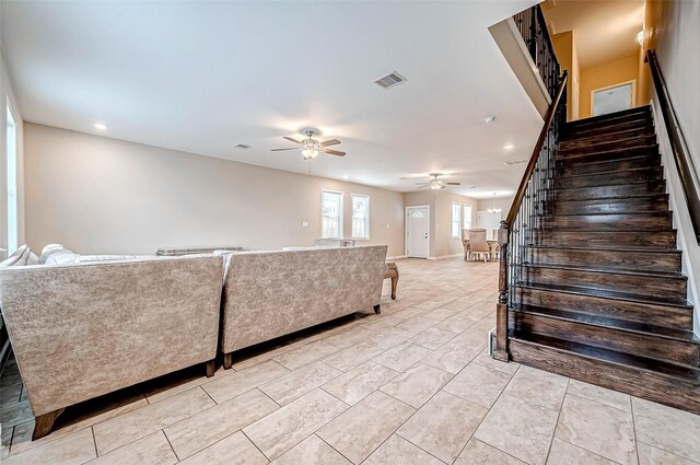 6702 Utah St, Houston, TX 77091 - stairs with ceiling fan and recessed lighting