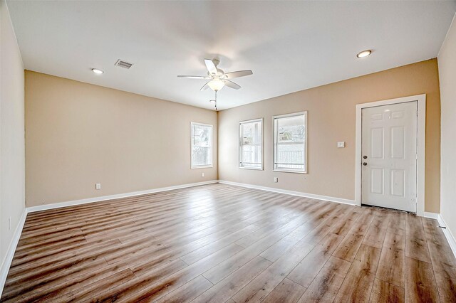 6702 Utah St, Houston, TX 77091 - spare room with a ceiling fan, light wood finished floors, baseboards, and recessed lighting