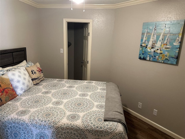 6300 Seawall Blvd Unit 9207, Galveston, TX 77551 - bedroom featuring wood finished floors, crown molding, and baseboards