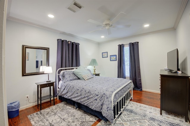 502 Enid St, Houston, TX 77009 - bedroom featuring crown molding, baseboards, wood finished floors, recessed lighting, and ceiling fan