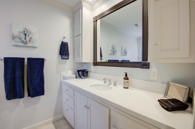 502 Enid St, Houston, TX 77009 - bathroom featuring ornamental molding, vanity, baseboards, and tile patterned floors