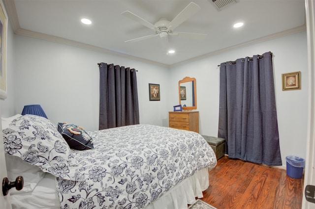 502 Enid St, Houston, TX 77009 - bedroom featuring ornamental molding, wood finished floors, recessed lighting, and a ceiling fan