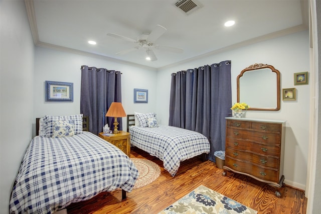 502 Enid St, Houston, TX 77009 - bedroom with wood finished floors, recessed lighting, ornamental molding, ceiling fan, and baseboards