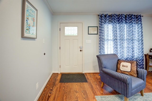 502 Enid St, Houston, TX 77009 - foyer with wood finished floors, baseboards, and ornamental molding