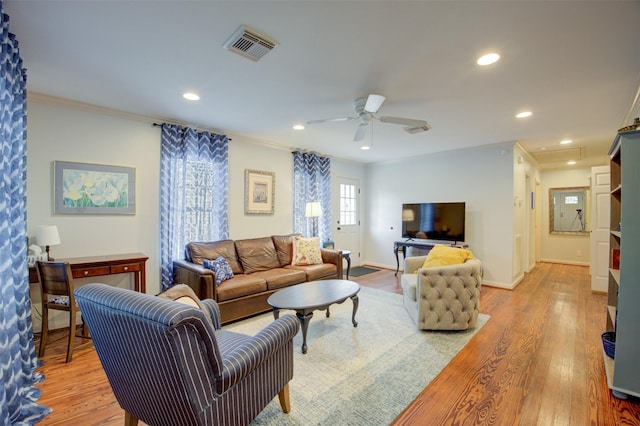 502 Enid St, Houston, TX 77009 - living area featuring crown molding, recessed lighting, wood finished floors, baseboards, and a ceiling fan