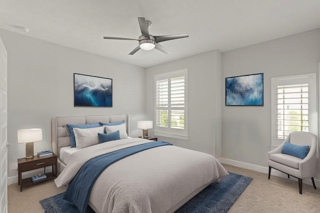 6602 Rochester Lake Loop, Katy, TX 77493 - bedroom featuring light carpet, baseboards, and ceiling fan