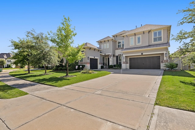 6602 Rochester Lake Loop, Katy, TX 77493 - view of front of house with stucco siding, concrete driveway, a garage, stone siding, and a standing seam roof
