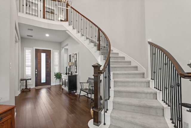 6602 Rochester Lake Loop, Katy, TX 77493 - foyer entrance with a high ceiling, stairs, wood finished floors, and baseboards