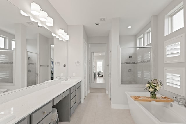 6602 Rochester Lake Loop, Katy, TX 77493 - full bathroom with a stall shower, vanity, tile patterned floors, a soaking tub, and recessed lighting