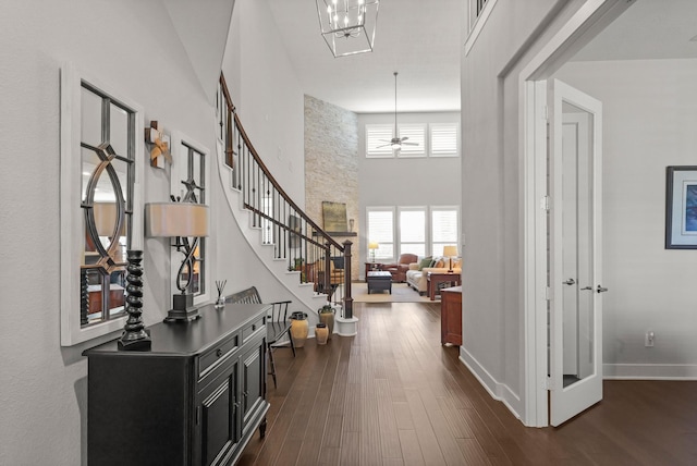 6602 Rochester Lake Loop, Katy, TX 77493 - foyer with dark wood-type flooring, a high ceiling, baseboards, stairs, and ceiling fan