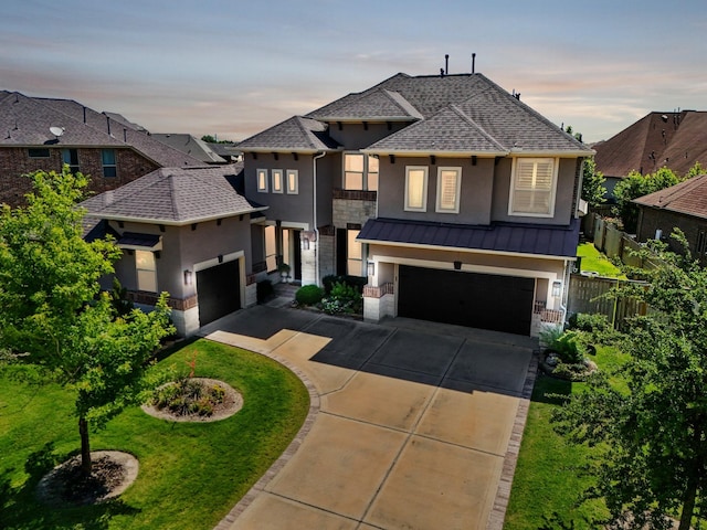 6602 Rochester Lake Loop, Katy, TX 77493 - view of front of property with stucco siding, concrete driveway, a shingled roof, stone siding, and a garage