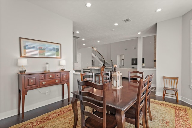 6602 Rochester Lake Loop, Katy, TX 77493 - dining area with recessed lighting, dark wood finished floors, stairway, and baseboards