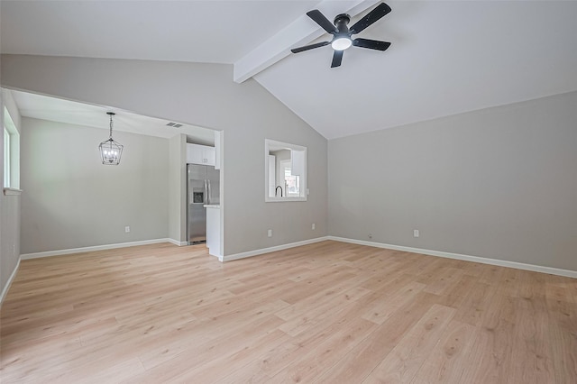 10623 Dunvegan Way, Houston, TX 77013 - unfurnished room featuring ceiling fan, light wood-style floors, baseboards, and a chandelier