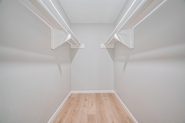10623 Dunvegan Way, Houston, TX 77013 - spacious closet with wood finished floors