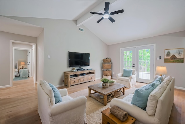 10623 Dunvegan Way, Houston, TX 77013 - living room with light wood-style flooring, a ceiling fan, and baseboards
