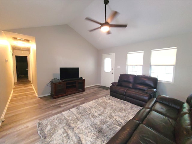 405 Wakefield Rd, Conroe, TX 77316 - living room featuring attic access, ceiling fan, plenty of natural light, lofted ceiling, and light wood-style flooring