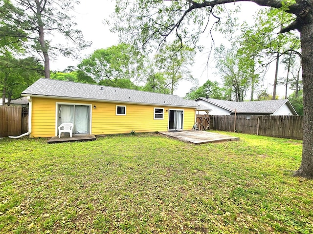 405 Wakefield Rd, Conroe, TX 77316 - back of property with a wooden deck