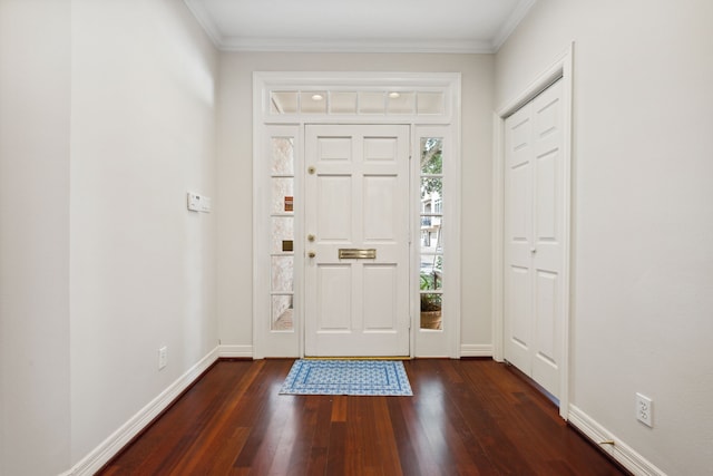 1938 Norfolk St, Houston, TX 77098 - foyer entrance featuring dark wood-style flooring, crown molding, and baseboards