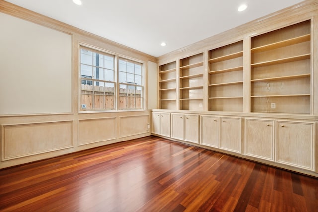 1938 Norfolk St, Houston, TX 77098 - spare room featuring dark wood-style flooring, recessed lighting, a decorative wall, and built in features