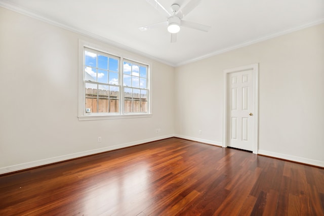 1938 Norfolk St, Houston, TX 77098 - spare room with ornamental molding, dark wood finished floors, ceiling fan, and baseboards