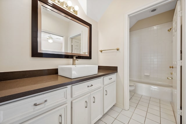 1938 Norfolk St, Houston, TX 77098 - bathroom with vanity, tile patterned flooring, toilet, and bathtub / shower combination