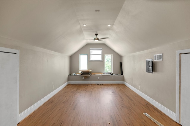 1509 Summer St, Houston, TX 77007 - additional living space with a ceiling fan, wood finished floors, vaulted ceiling, and baseboards