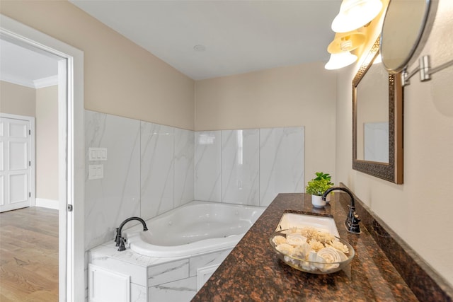1509 Summer St, Houston, TX 77007 - bathroom with a garden tub, crown molding, wood finished floors, and vanity