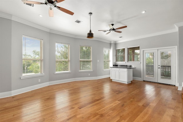 1509 Summer St, Houston, TX 77007 - unfurnished living room with a ceiling fan, healthy amount of natural light, crown molding, light wood-style floors, and recessed lighting