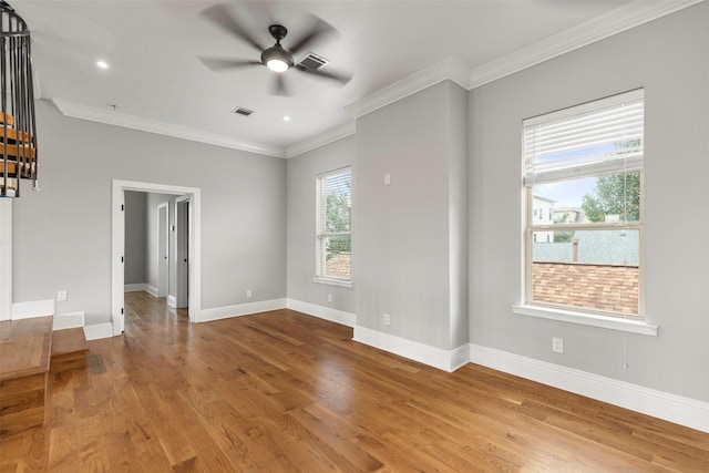 1509 Summer St, Houston, TX 77007 - empty room featuring a ceiling fan, wood finished floors, baseboards, crown molding, and recessed lighting