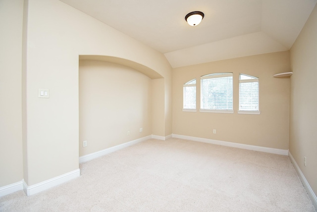 1611 Whitfield St, Sugar Land, TX 77479 - empty room with light colored carpet, lofted ceiling, and baseboards