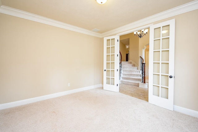 1611 Whitfield St, Sugar Land, TX 77479 - carpeted empty room featuring french doors, ornamental molding, a chandelier, and baseboards