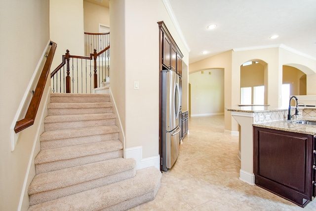1611 Whitfield St, Sugar Land, TX 77479 - staircase with ornamental molding, recessed lighting, tile patterned flooring, and baseboards