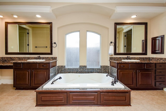 1611 Whitfield St, Sugar Land, TX 77479 - full bathroom with a jetted tub, two vanities, tile patterned floors, and ornamental molding
