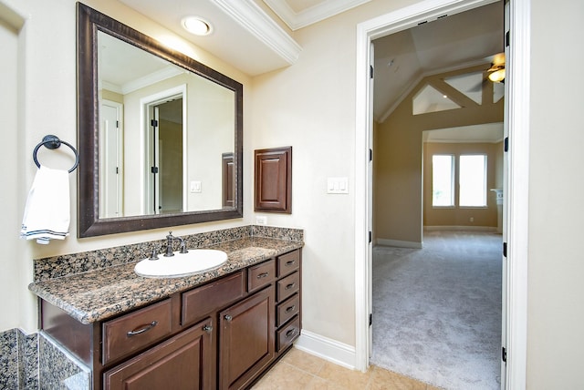 1611 Whitfield St, Sugar Land, TX 77479 - bathroom with ornamental molding, baseboards, vanity, and a ceiling fan