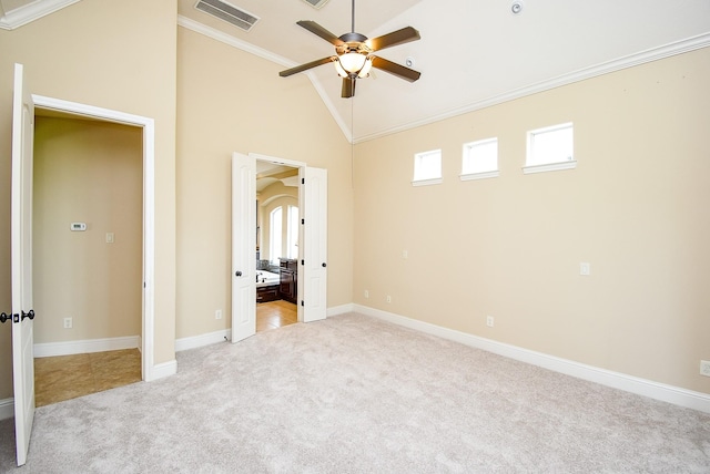 1611 Whitfield St, Sugar Land, TX 77479 - unfurnished bedroom with ornamental molding, light colored carpet, baseboards, connected bathroom, and high vaulted ceiling