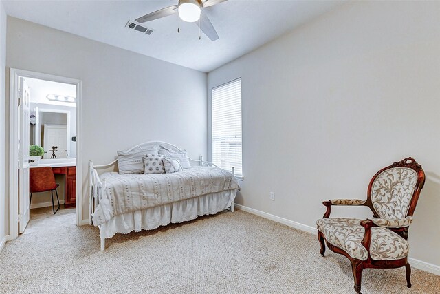 2102 Ivy Cove Ct, Katy, TX 77494 - bedroom featuring light colored carpet, baseboards, connected bathroom, and a ceiling fan