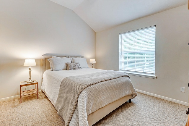 2102 Ivy Cove Ct, Katy, TX 77494 - carpeted bedroom with vaulted ceiling and baseboards