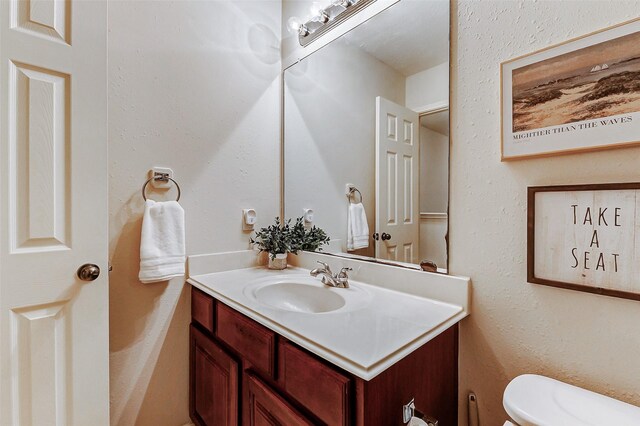 2102 Ivy Cove Ct, Katy, TX 77494 - bathroom featuring vanity and toilet