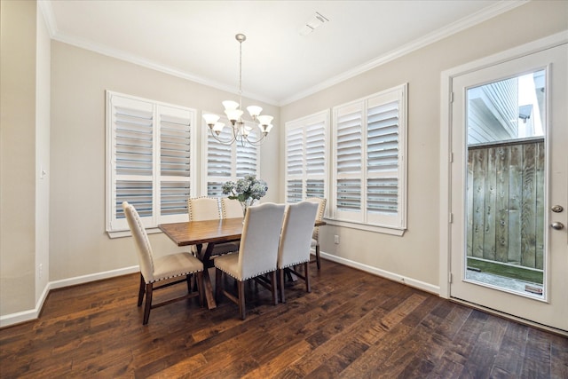 8918 Aventino Way, Houston, TX 77080 - dining area featuring a chandelier, crown molding, wood finished floors, and baseboards