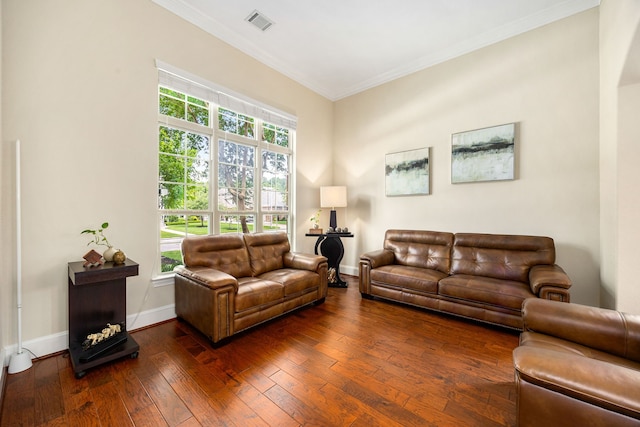 6019 Majestic Pines Dr, Houston, TX 77345 - living area with ornamental molding, dark wood-style flooring, and baseboards
