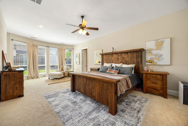 6019 Majestic Pines Dr, Houston, TX 77345 - bedroom with light colored carpet, recessed lighting, and ceiling fan