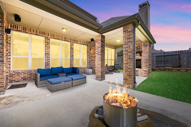 6019 Majestic Pines Dr, Houston, TX 77345 - view of patio with an outdoor living space with a fireplace