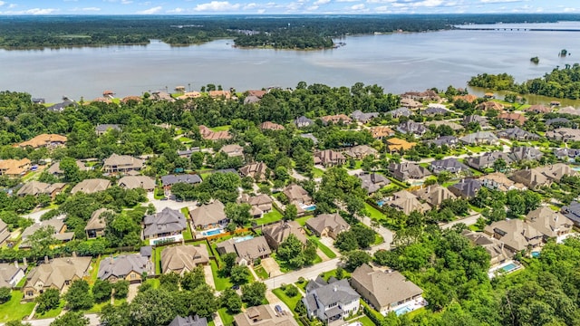 6019 Majestic Pines Dr, Houston, TX 77345 - aerial view of residential area featuring a large body of water